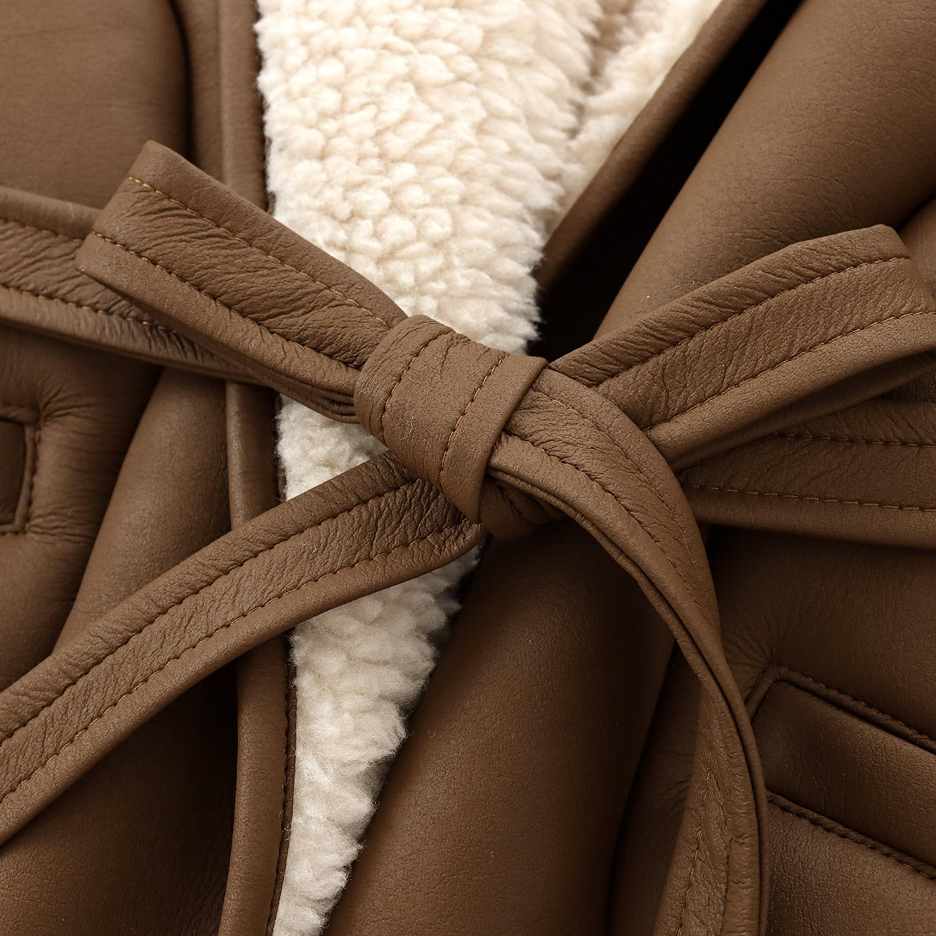 Brown leather coat with a tie belt for langry fashion and stylish ملابس looks