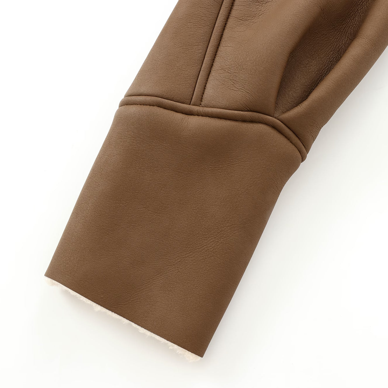 Brown sleeve cuff from Cozy Leather Jacket showcasing sophisticated fashion and ملابس style