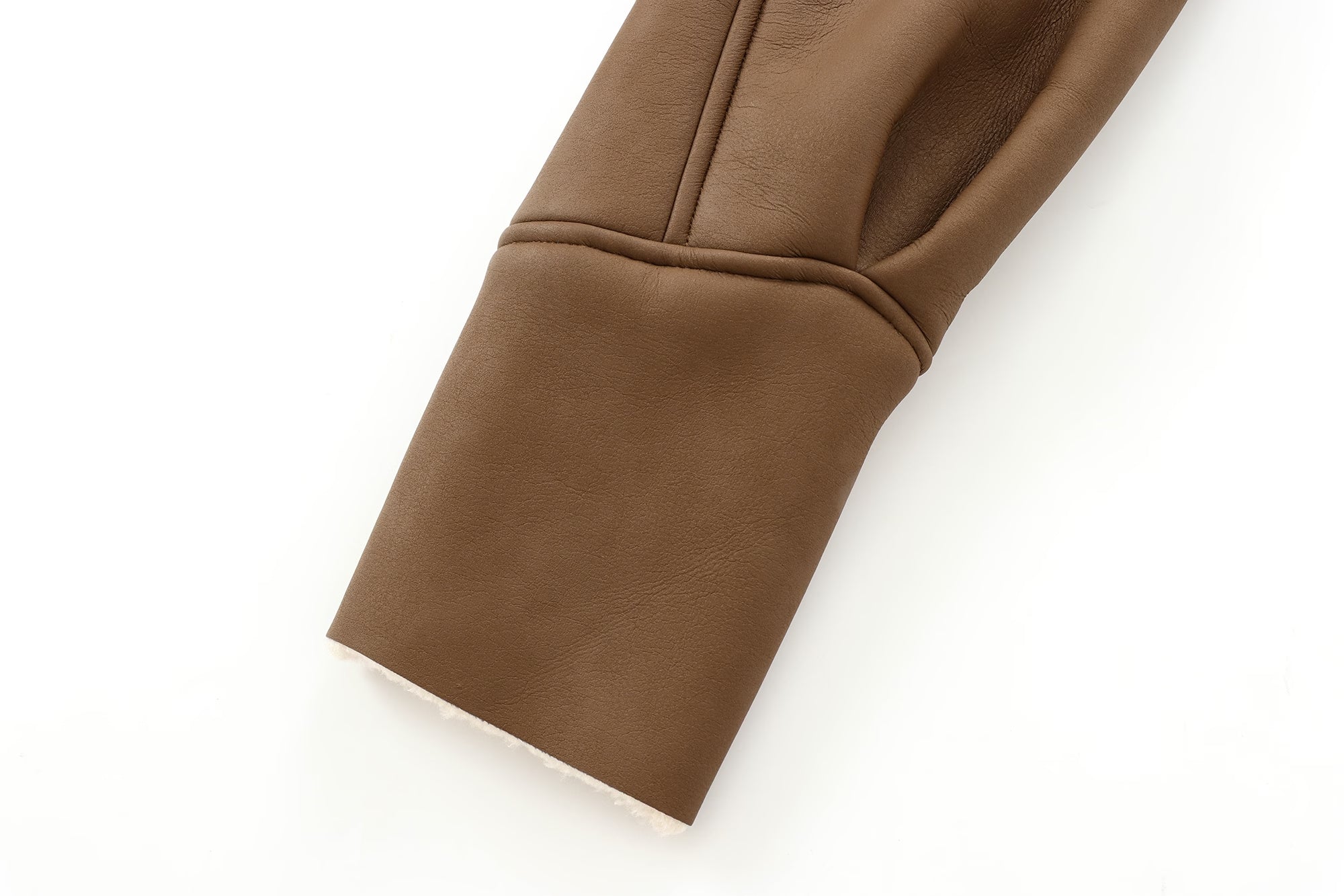 Brown sleeve cuff from Cozy Leather Jacket showcasing sophisticated fashion and ملابس style