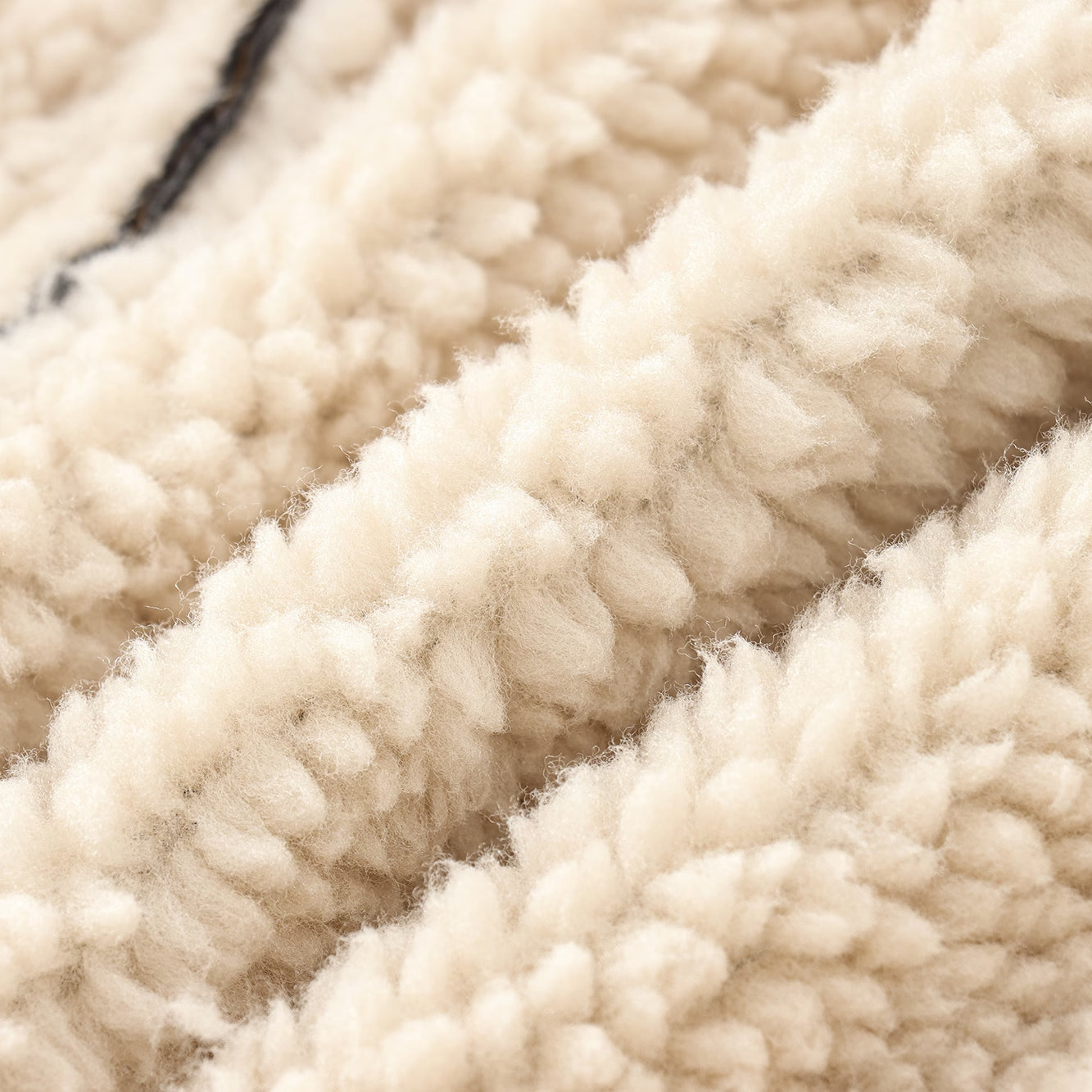 Creamy textured fleece fabric from Cozy Leather Jacket, perfect for fashionable ملابس