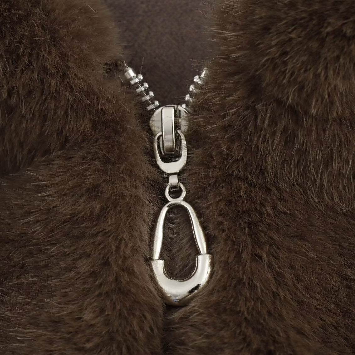Brown fur coat with silver zipper from Langry, perfect for winter fashion ملابس
