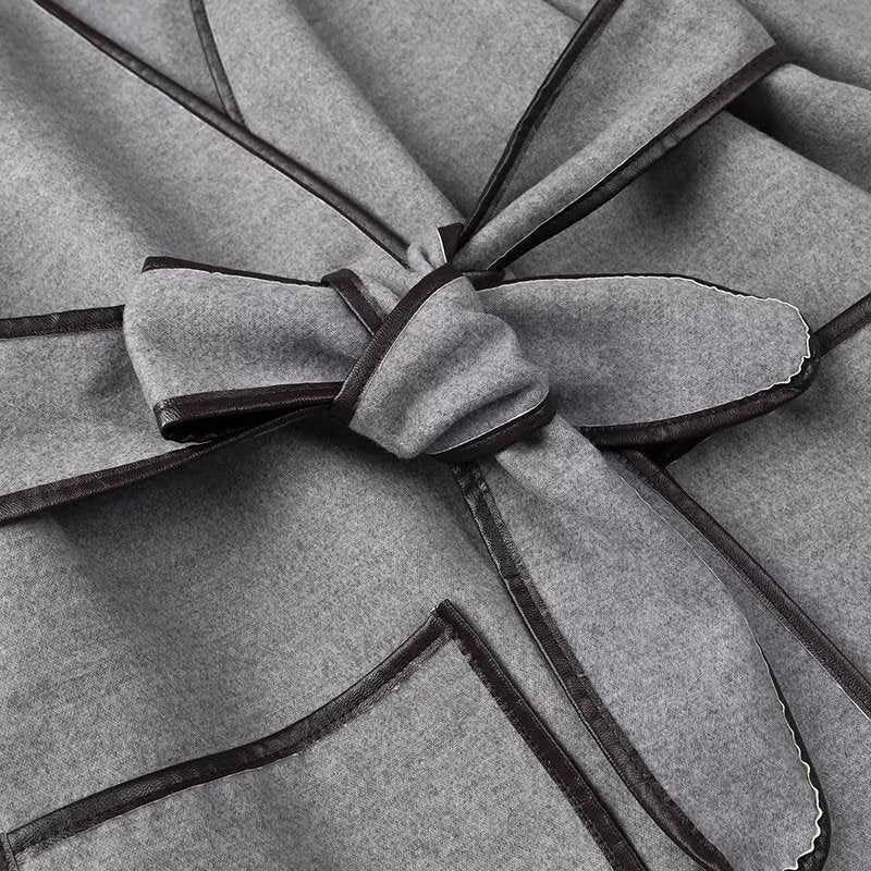 Gray felt coat with black leather trim and tied bow closure from Fashionable Color Reversible Woolen Coat, perfect for stylish ملابس
