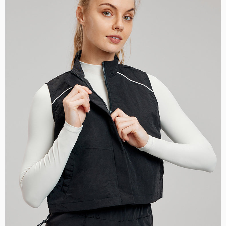 Black cropped vest with white trim featured in Comfy Loose Sports Vest for stylish sports fashion