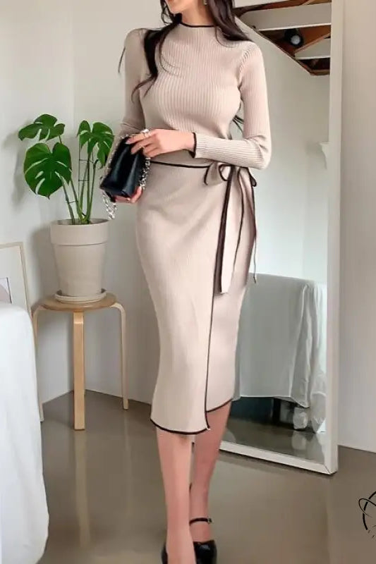 Langry fashion beige knit dress with black trim, high neck slim mid-length winter style