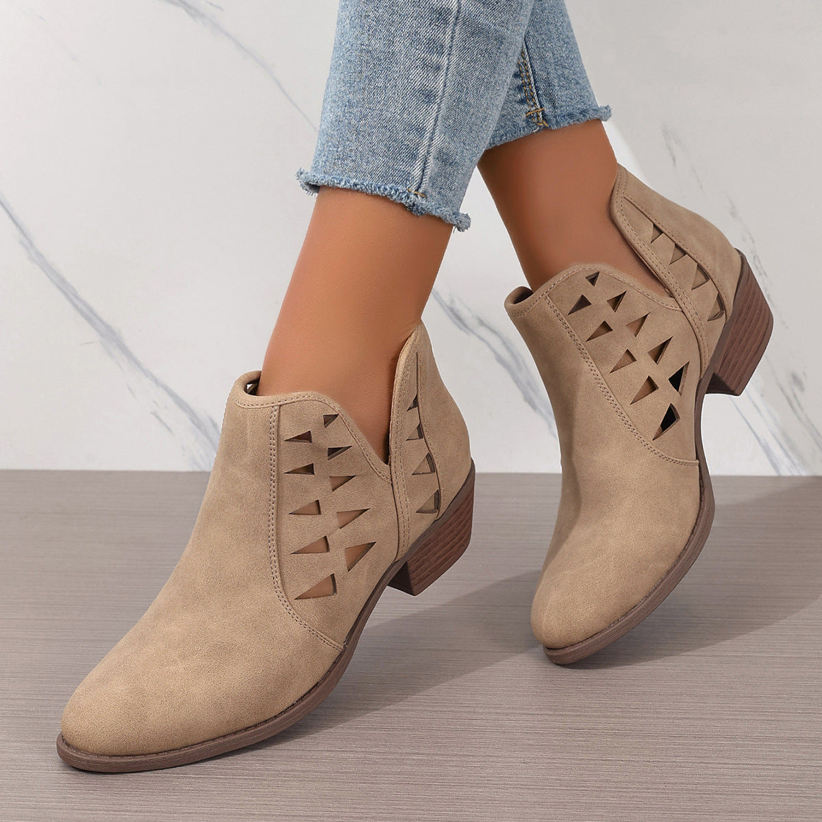 Beige suede Daily Ankle Boots featuring triangular cutout details on the sides