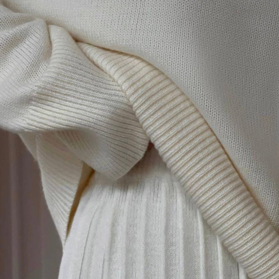 Cream-colored knitwear from Cute Knitted Skirt Sets featuring a cute knitted skirt design