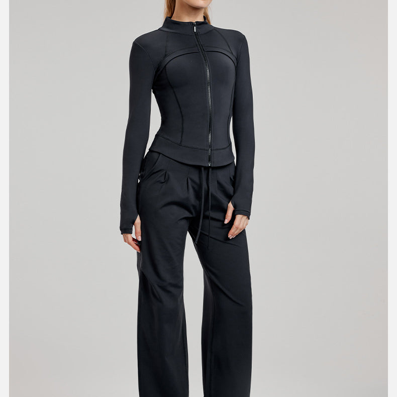 Woman in black athletic wear showcasing Winter Fleece-lined Yoga Jacket for stylish ملابس and langry fashion