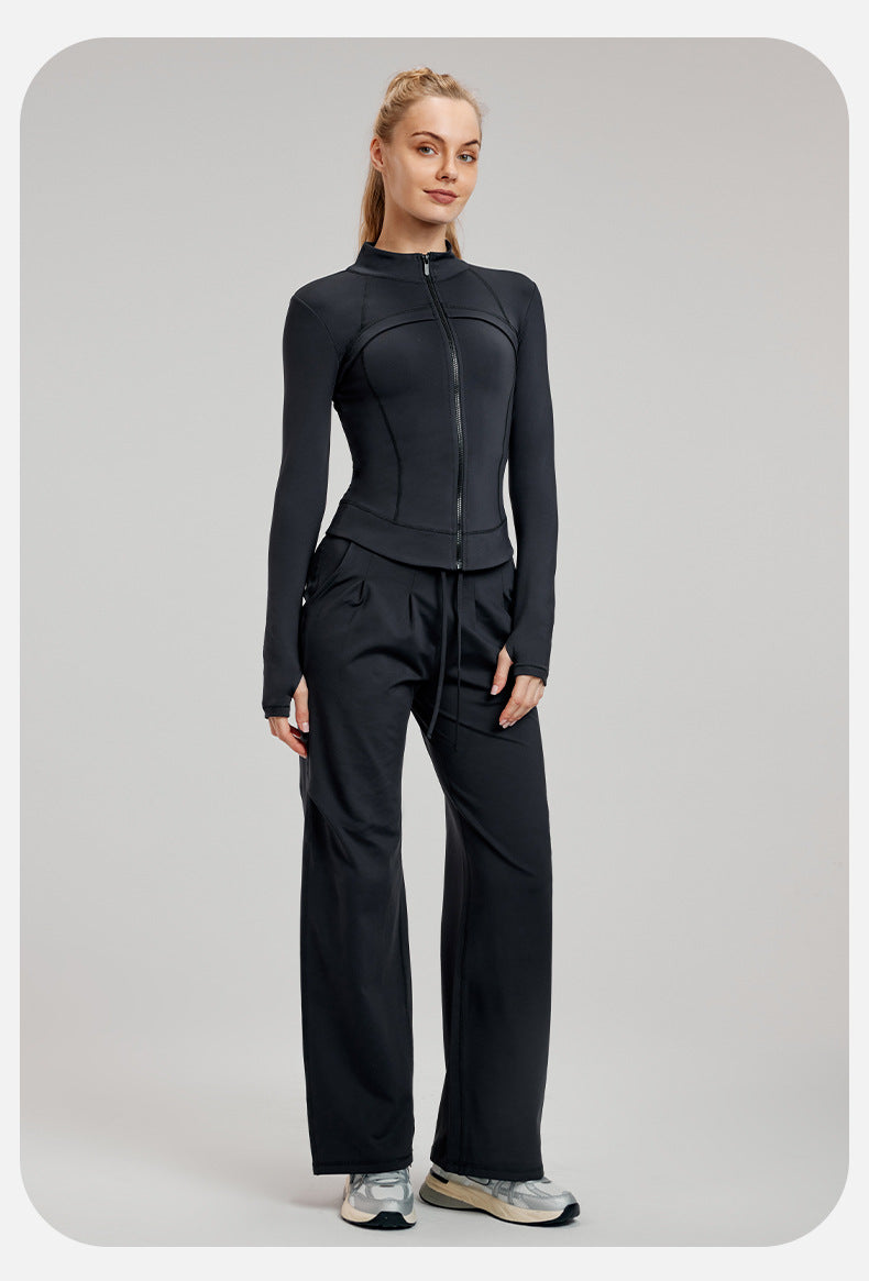 Woman in black athletic wear showcasing Winter Fleece-lined Yoga Jacket for stylish ملابس and langry fashion