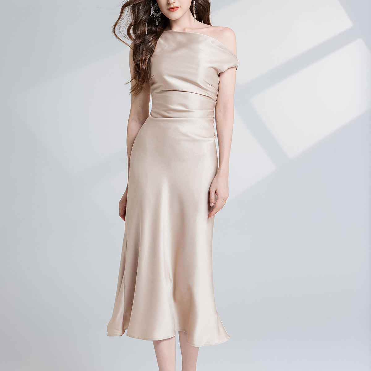 Elegant champagne-colored maxi dress displayed in Beautiful One Shoulder Maxi Dress for fashion