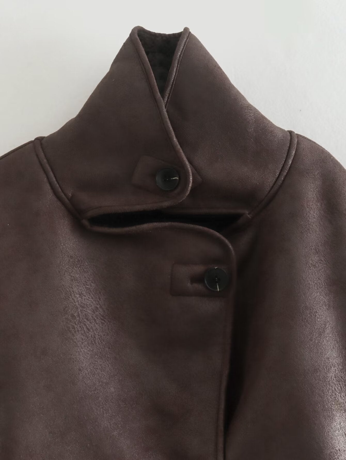Elegant brown leather Langry fashion jacket with high collar and button closure