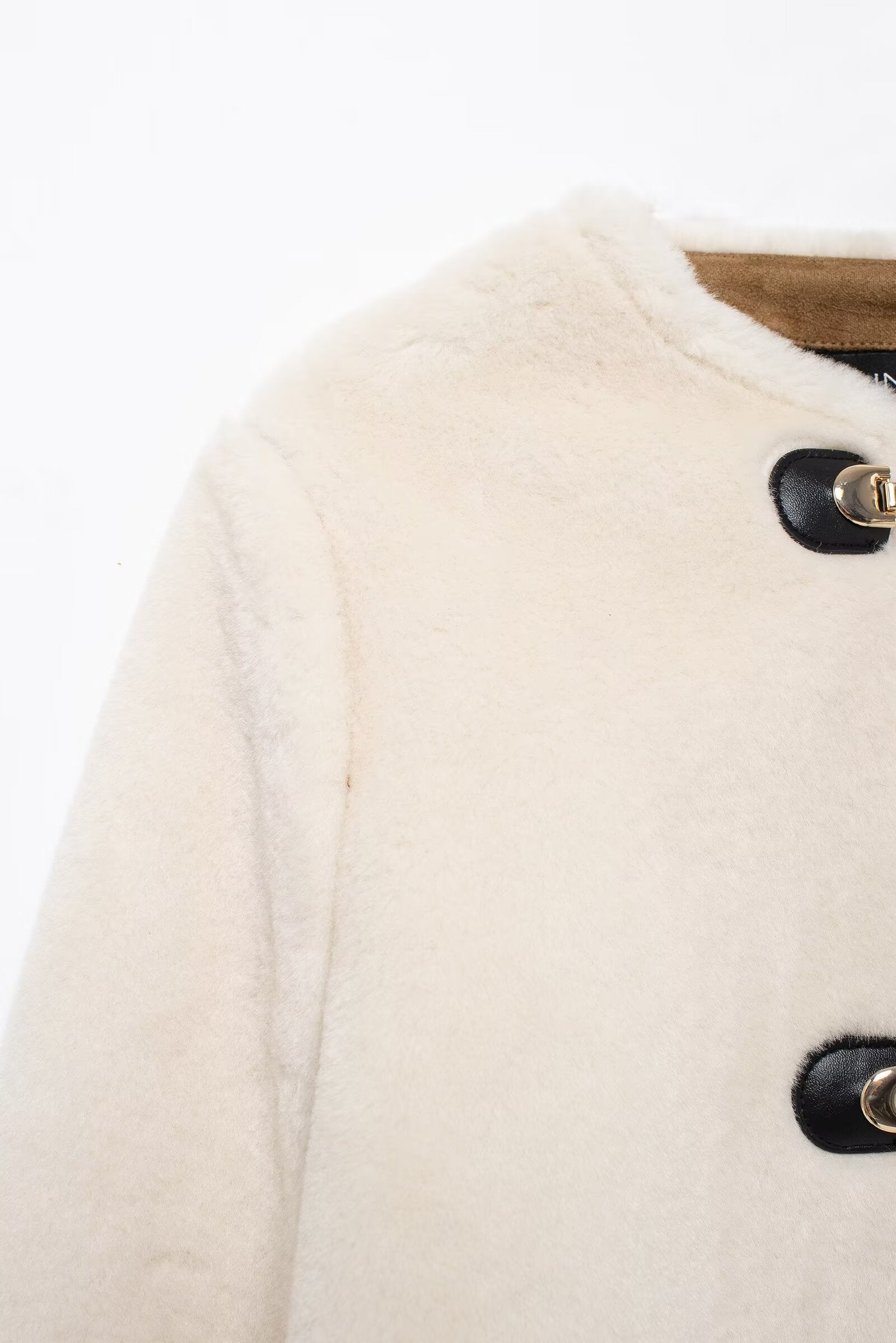 Cream-colored faux fur coat from the Winter Double Sided String Button Jacket fashion collection