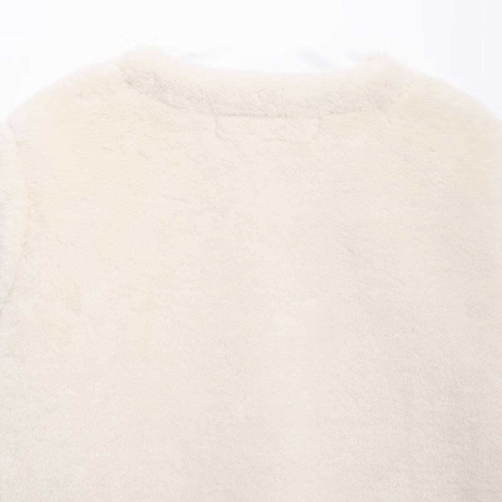 Cream-colored fuzzy sweater with faux fur accents from Winter Double Sided String Button Jacket collection for cozy winter fashion