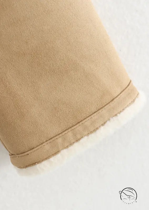 Beige suede shearling bootie with white fur trim for langry winter fashion