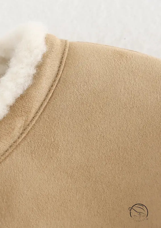 Beige shearling-lined langry fashion bootie with fur trim for winter street style