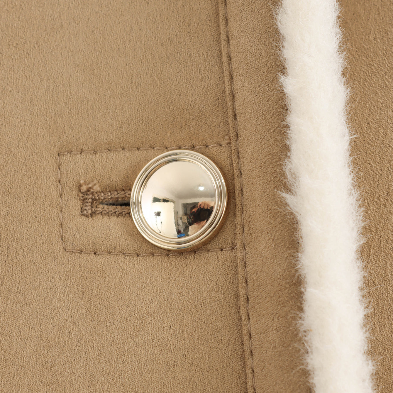 Winter fashion beige suede coat with silver buttons and white fur trim