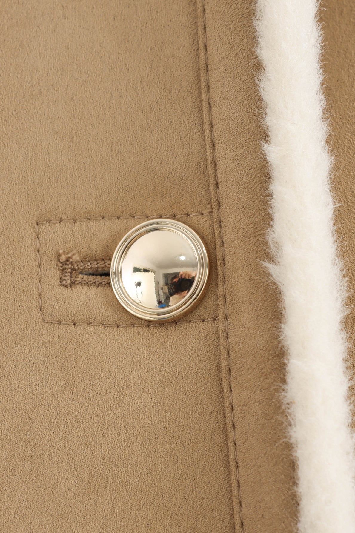 Winter fashion beige suede coat with silver buttons and white fur trim