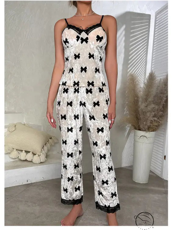 Women’s bowknot velvet pajamas in white with black bow print and lace trim