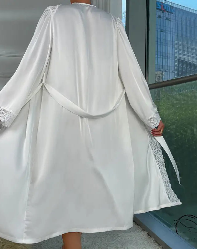 Luxury satin robe with lace trim on sleeves and front, tied at waist