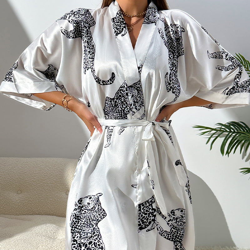 White wrap dress featuring black leopard print and kimono sleeves, stylish casual langry
