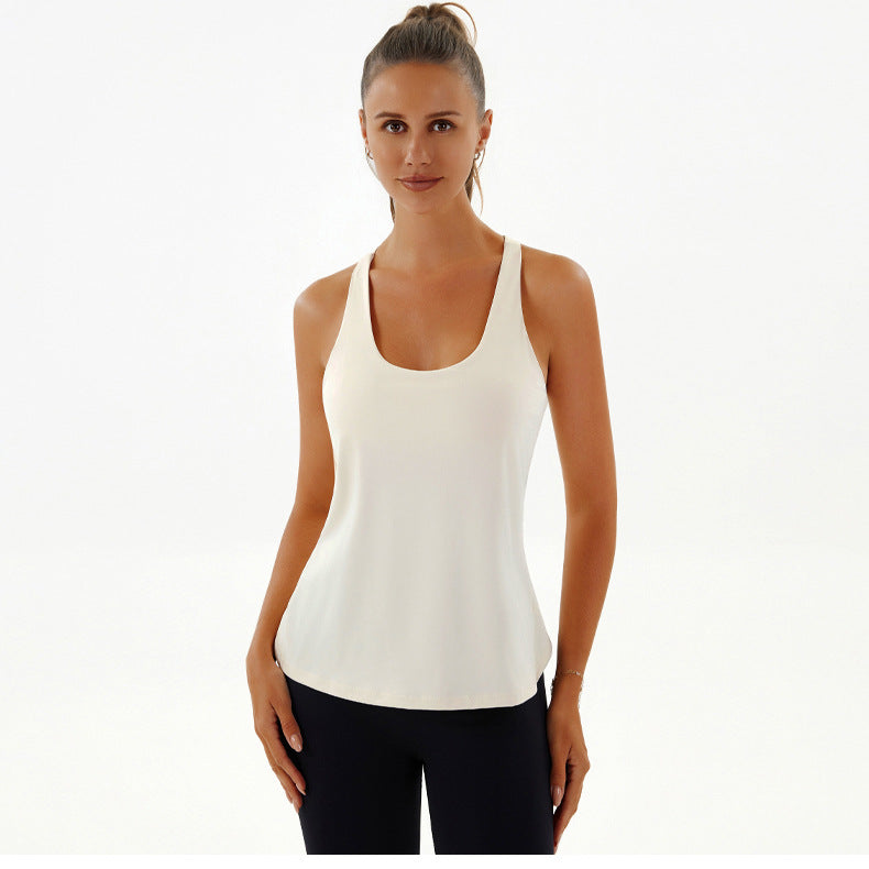 Woman in a white tank top showcasing Yoga Breathable Top, perfect for fashion and ملابس