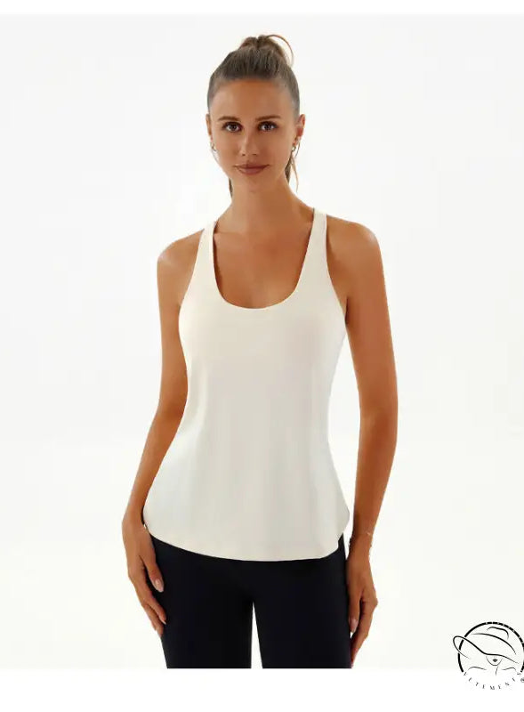 Woman in yoga breathable Langry fashion white tank top