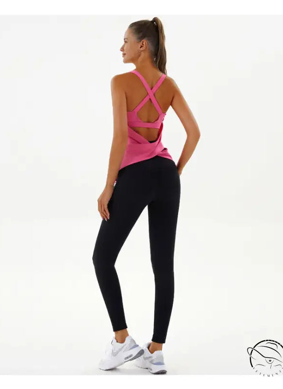 Woman in pink yoga breathable top and black leggings by Langry fashion