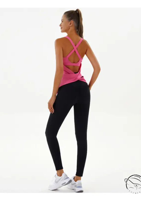 Woman in pink yoga breathable top and black leggings by Langry fashion