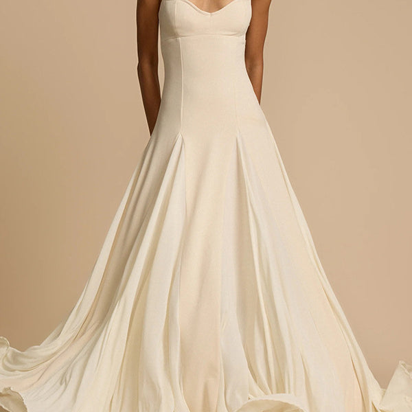 Elegant ivory gown showcasing a casual loose large swing dress style