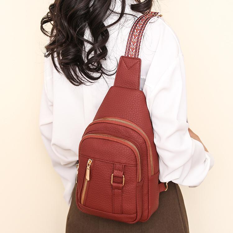 Burgundy faux leather sling bag for fashion and ملابس, lightweight trendy chest bag