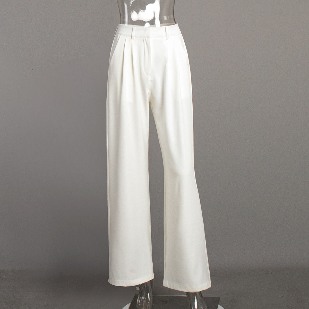 Pure white office trousers featuring high-waisted wide-leg design with front pleats