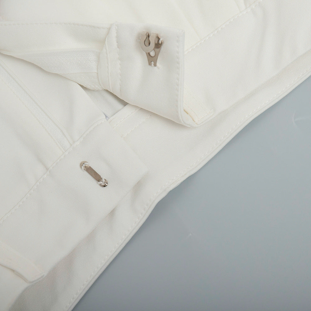 Pure white office trousers featuring hook and bar fasteners for a sleek professional look