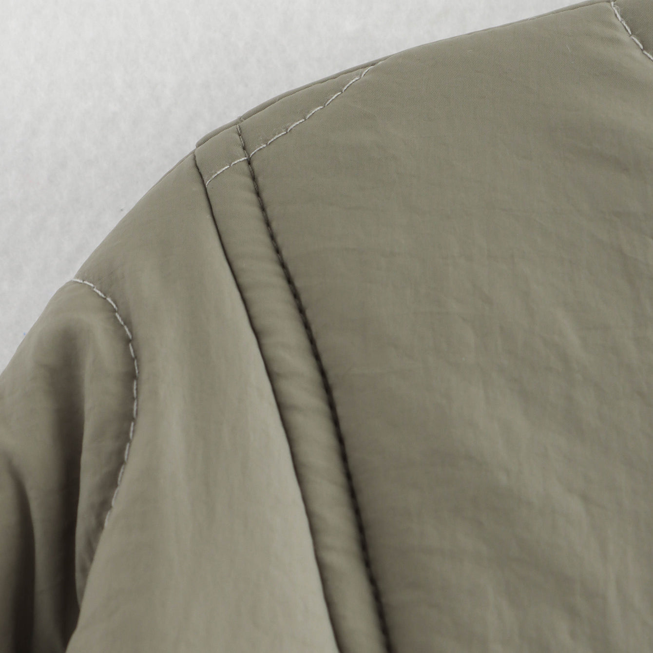 Olive green quilted jacket detail of All Match Leopard Print Cotton Coat in fashion ملابس