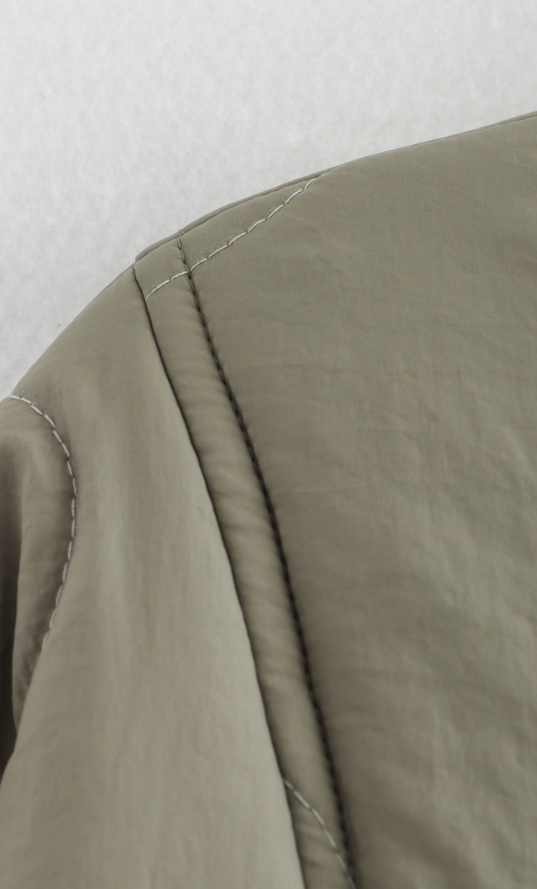 Olive green quilted jacket detail of All Match Leopard Print Cotton Coat in fashion ملابس