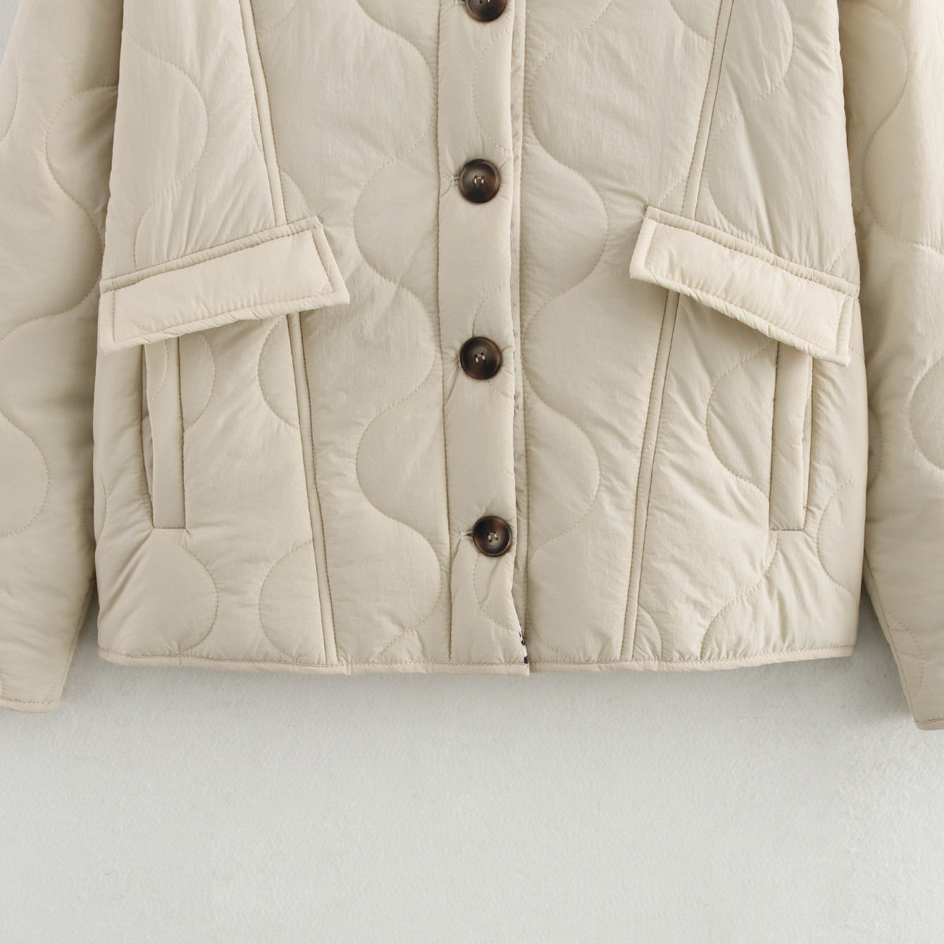 Beige quilted jacket with button closure from the All Match Leopard Print Cotton Coat fashion collection