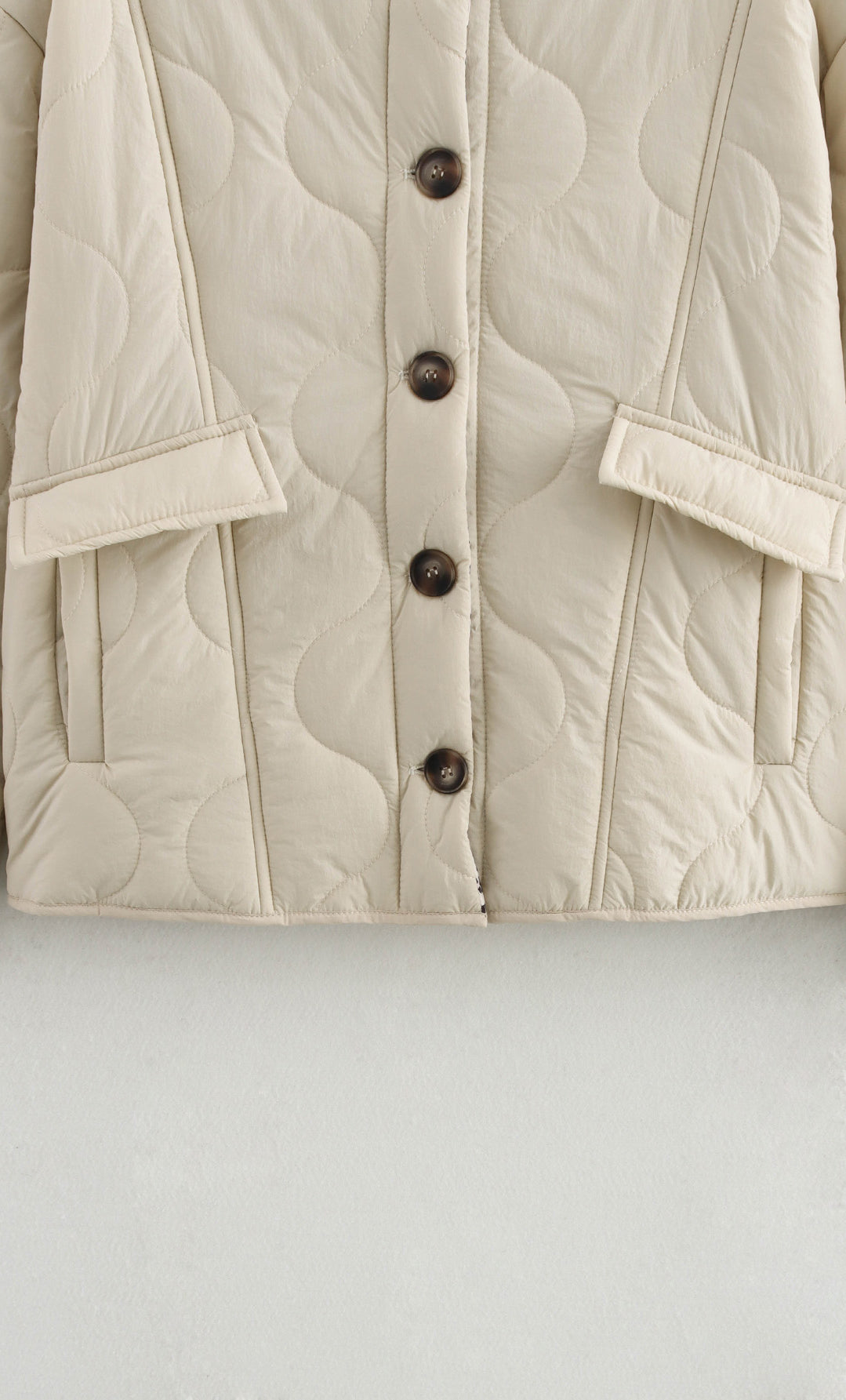 Beige quilted jacket with button closure from the All Match Leopard Print Cotton Coat fashion collection