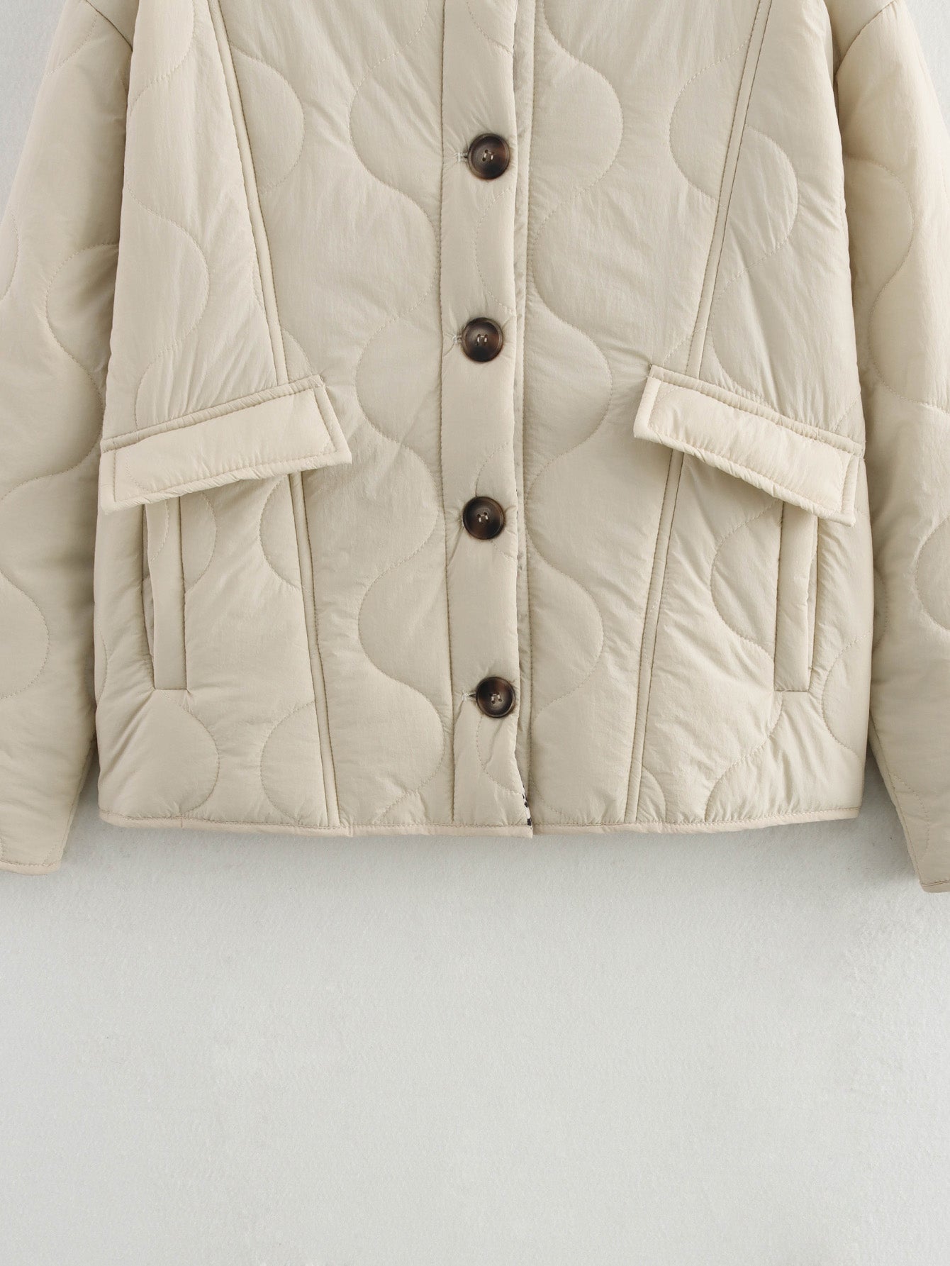 Beige quilted jacket with button closure from the All Match Leopard Print Cotton Coat fashion collection