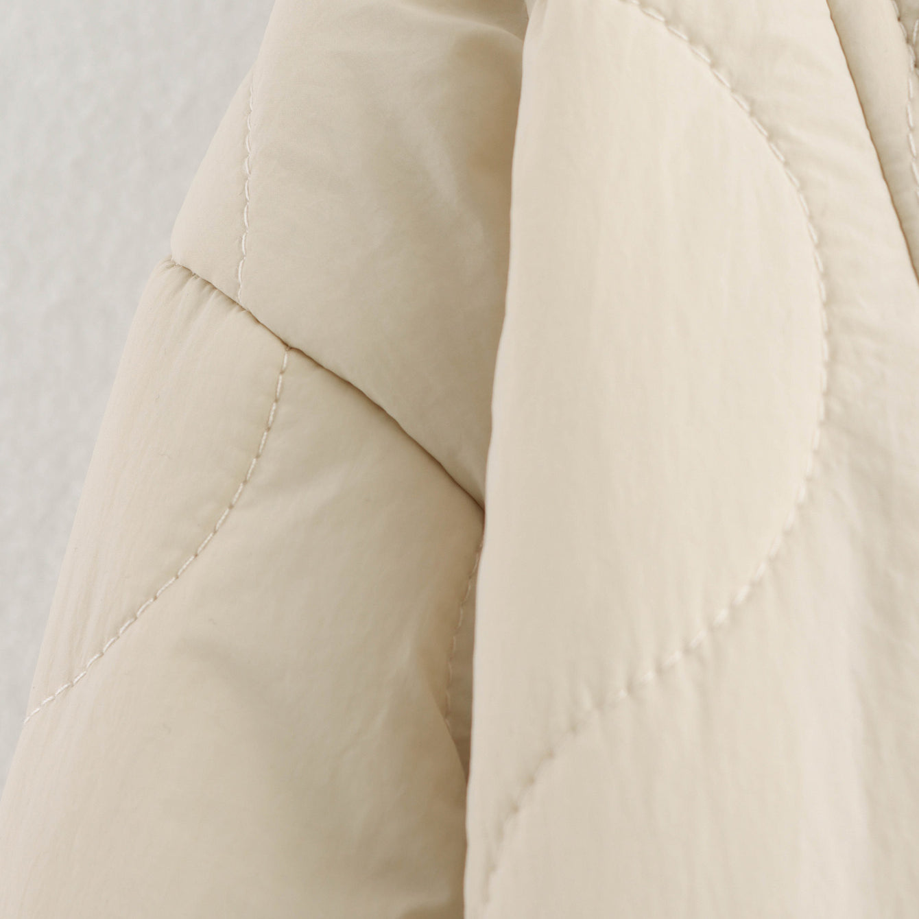 Beige quilted jacket detail of All Match Leopard Print Cotton Coat, a trendy fashion piece