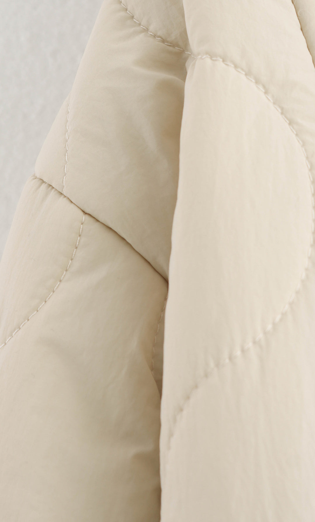 Beige quilted jacket detail of All Match Leopard Print Cotton Coat, a trendy fashion piece