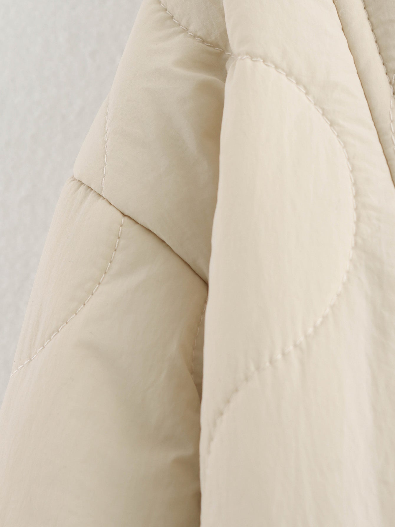 Beige quilted jacket detail of All Match Leopard Print Cotton Coat, a trendy fashion piece