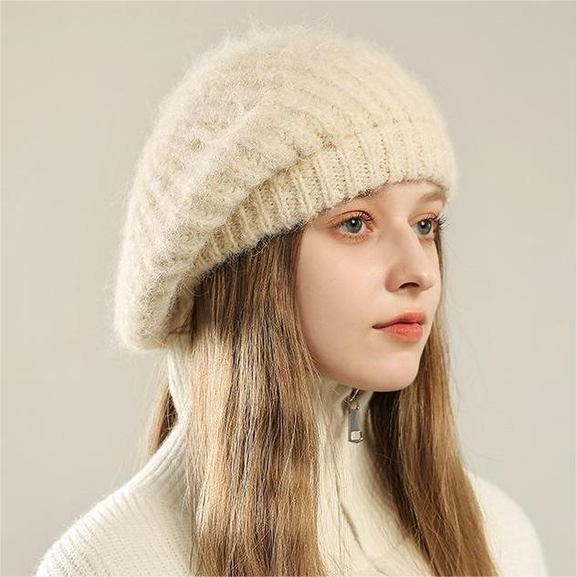 Cream-colored knitted British retro wool painter cap showcasing elegant design