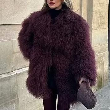 Plush dark purple faux fur coat showcasing luxurious faux fur fashion style