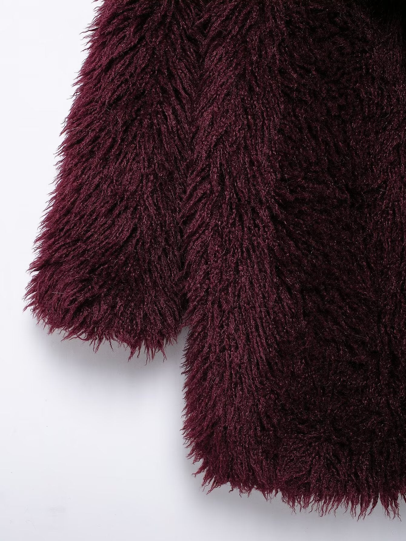 Close-up of dark red faux fur effect mid-length coat with long sleeves for fashion