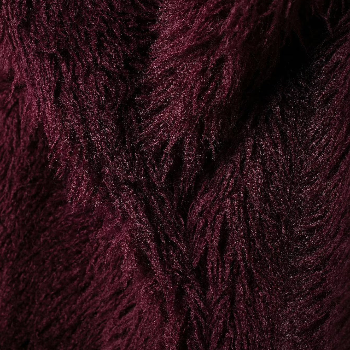 Textured dark red faux fur fabric from the Faux Fur Effect Mid Length Coat, perfect for fashion