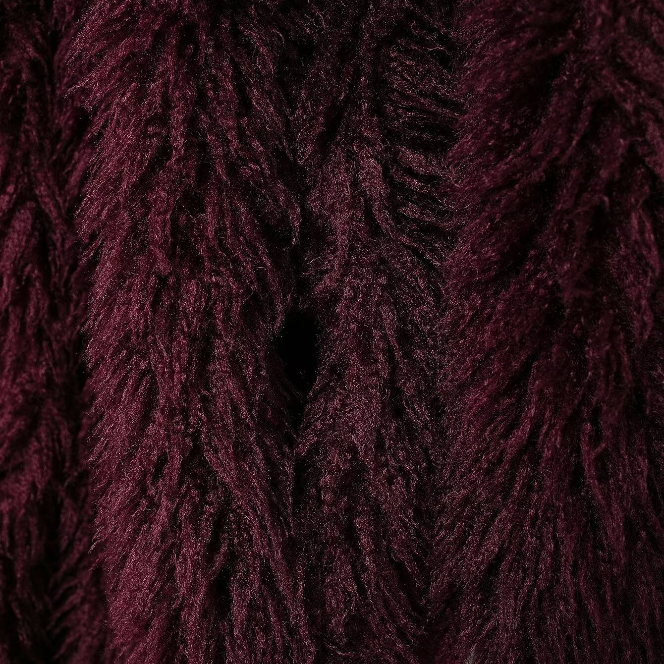 Close-up of luxurious dark red faux fur fabric on Faux Fur Effect Mid Length Coat