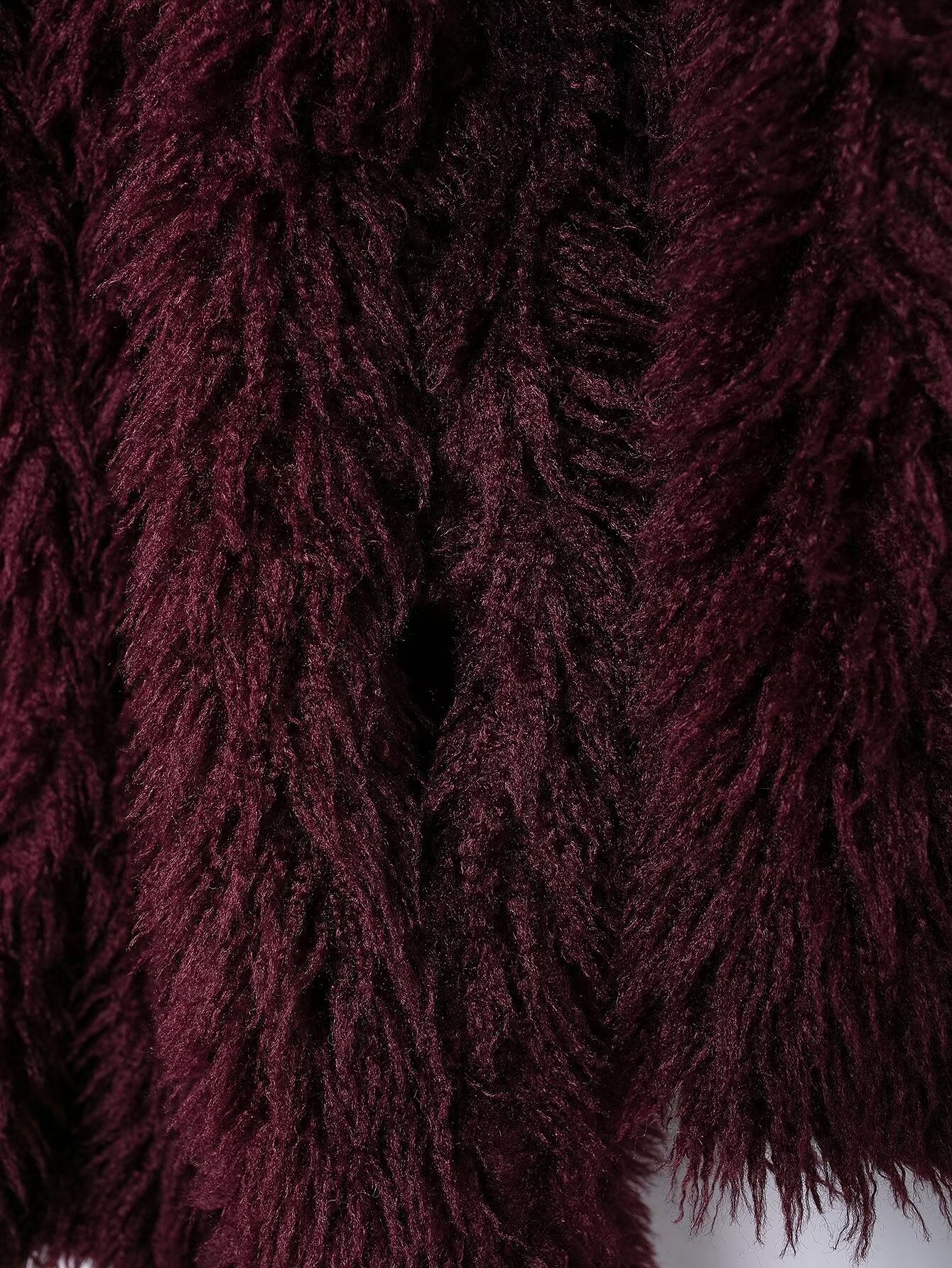 Close-up of luxurious dark red faux fur fabric on Faux Fur Effect Mid Length Coat