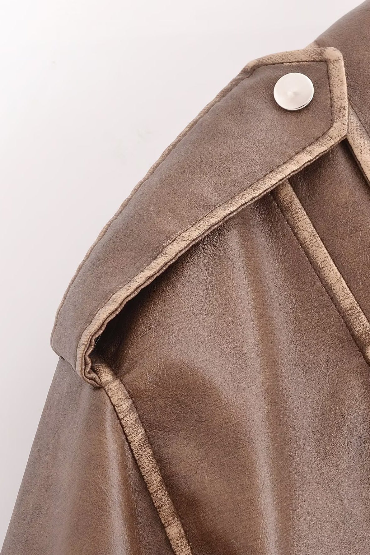 Winter Street faux leather motorcycle jacket with brown leather silver buttons and stitching details