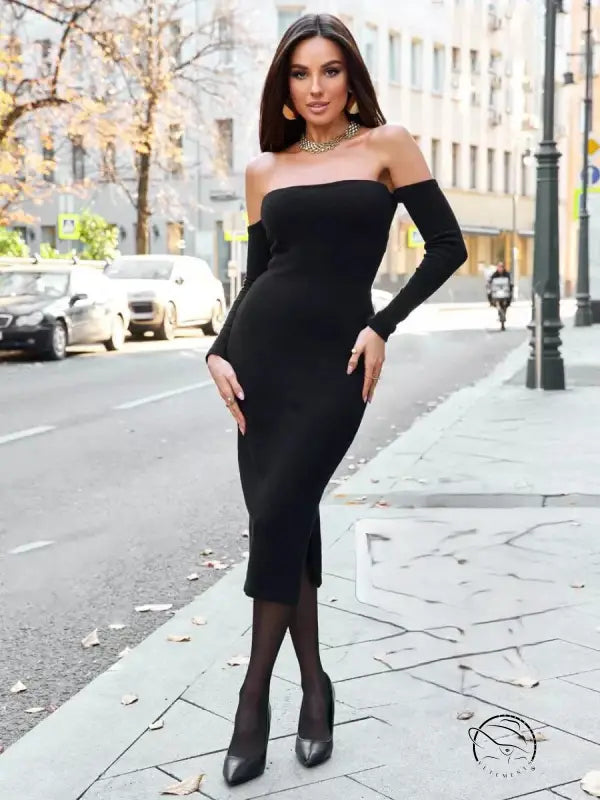 Elegant woman in black off-shoulder langry fashion knitted dress