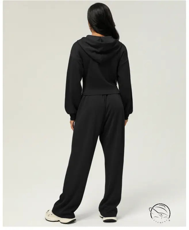 Black loose hooded coat with casual sweatpants outdoor outfit