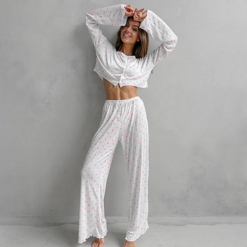 White two-piece pajamas with subtle pink floral pattern and knitted heart printing design