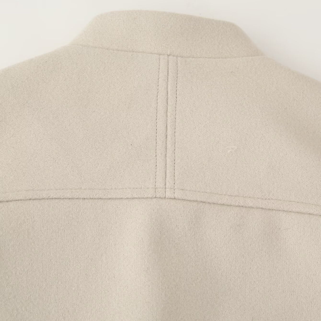 Beige single breasted Langry casual pocket jacket with smooth texture